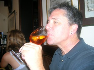 My husband Eddie, in Venice, Italy enjoying his Aperol Spritz